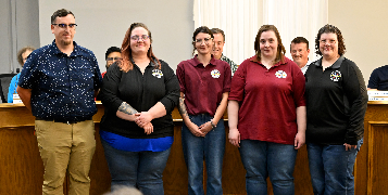 Image of 4 dispatchers recognized for service during severe weather