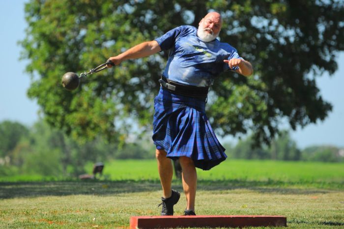 Photograph of a competitor competing in a ball toss event at the highland games